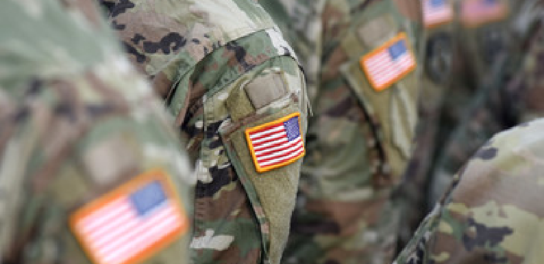 Military members with American flag patch